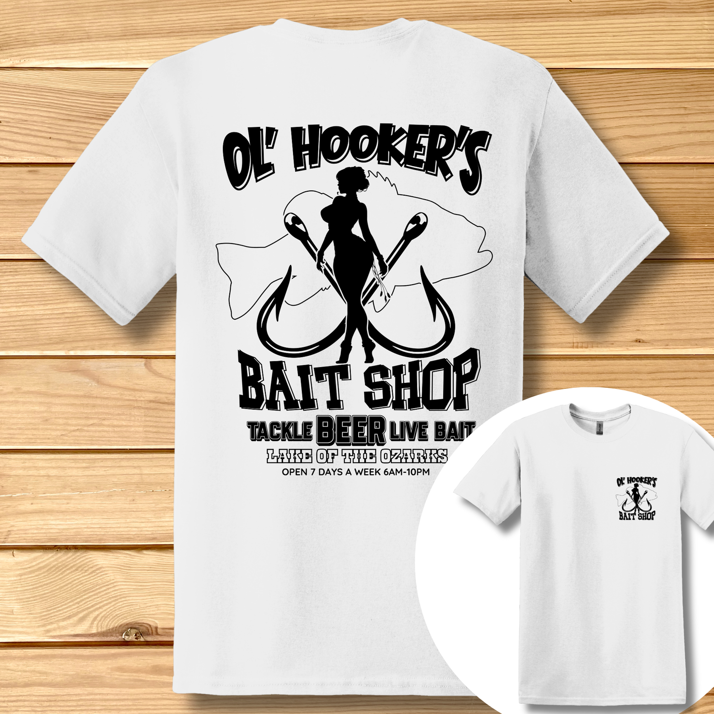 White t-shirt with black graphic design on a wooden surface