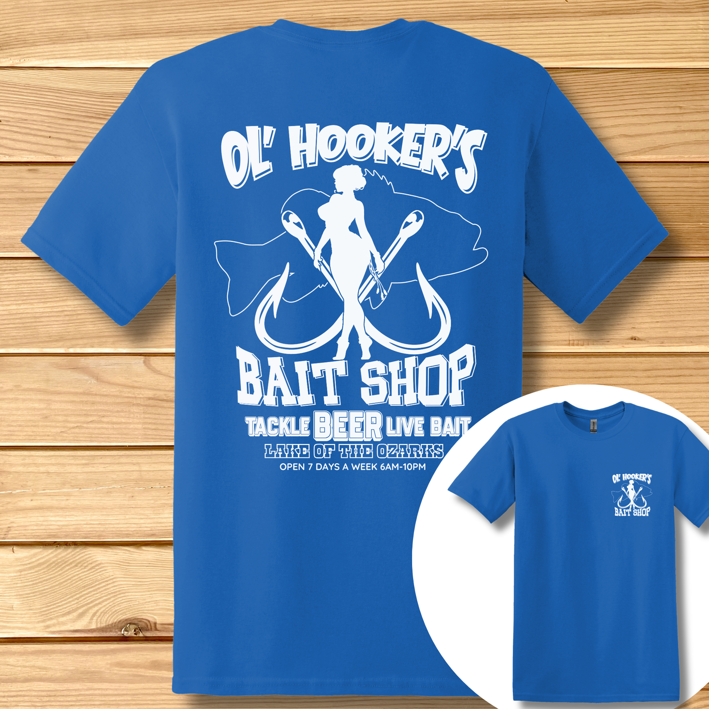 Blue t-shirt with white graphic and text on a wooden surface