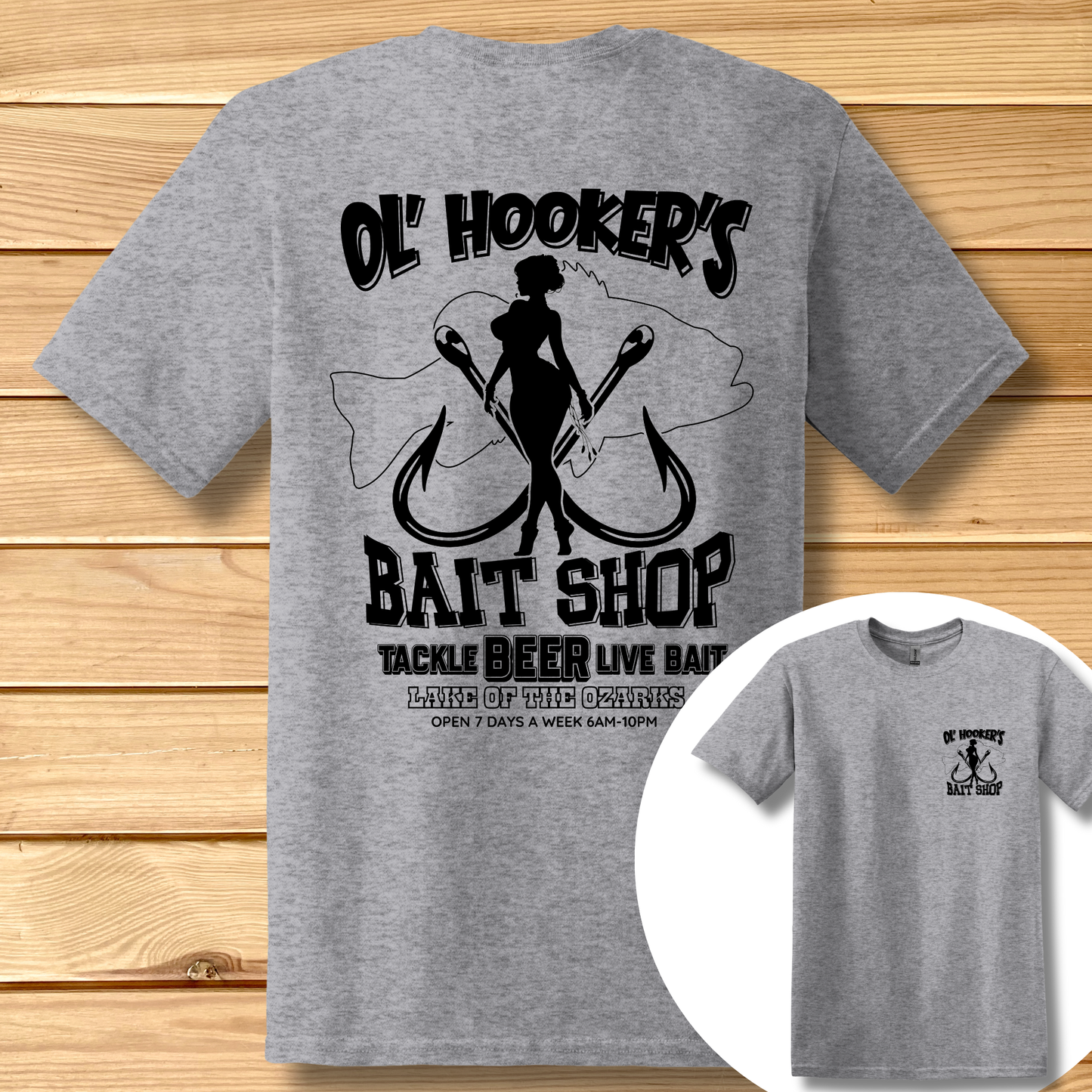 Gray t-shirt with black graphic design on a wooden surface