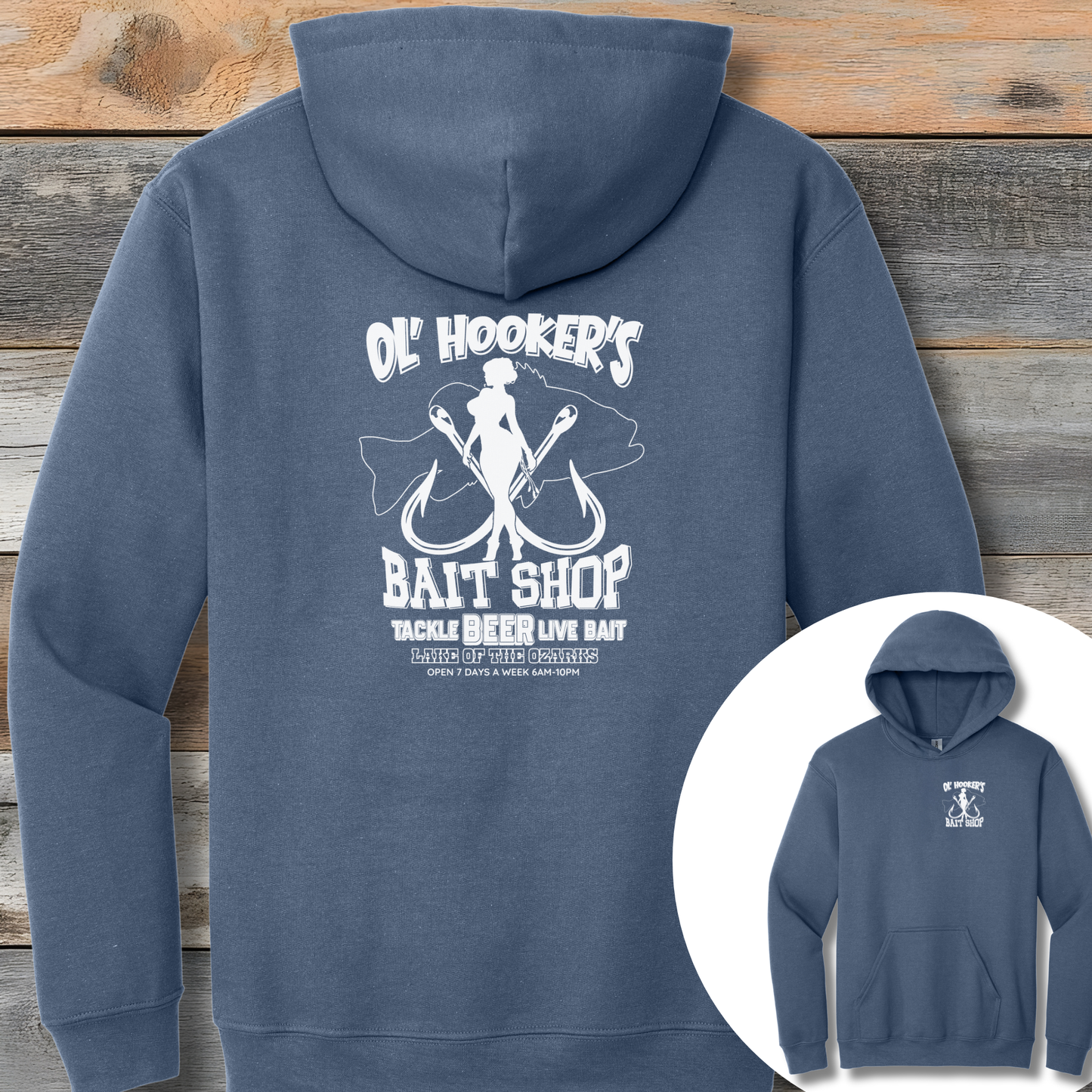 Blue hoodie with white graphic and text on a wooden background