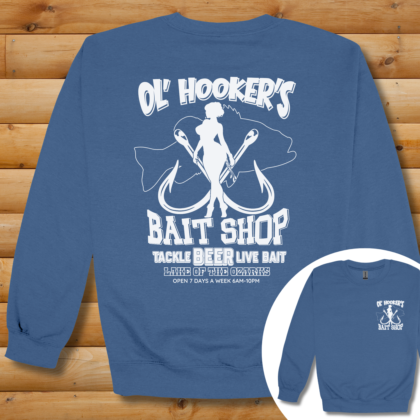 Blue sweatshirt with white graphic design on a wooden background