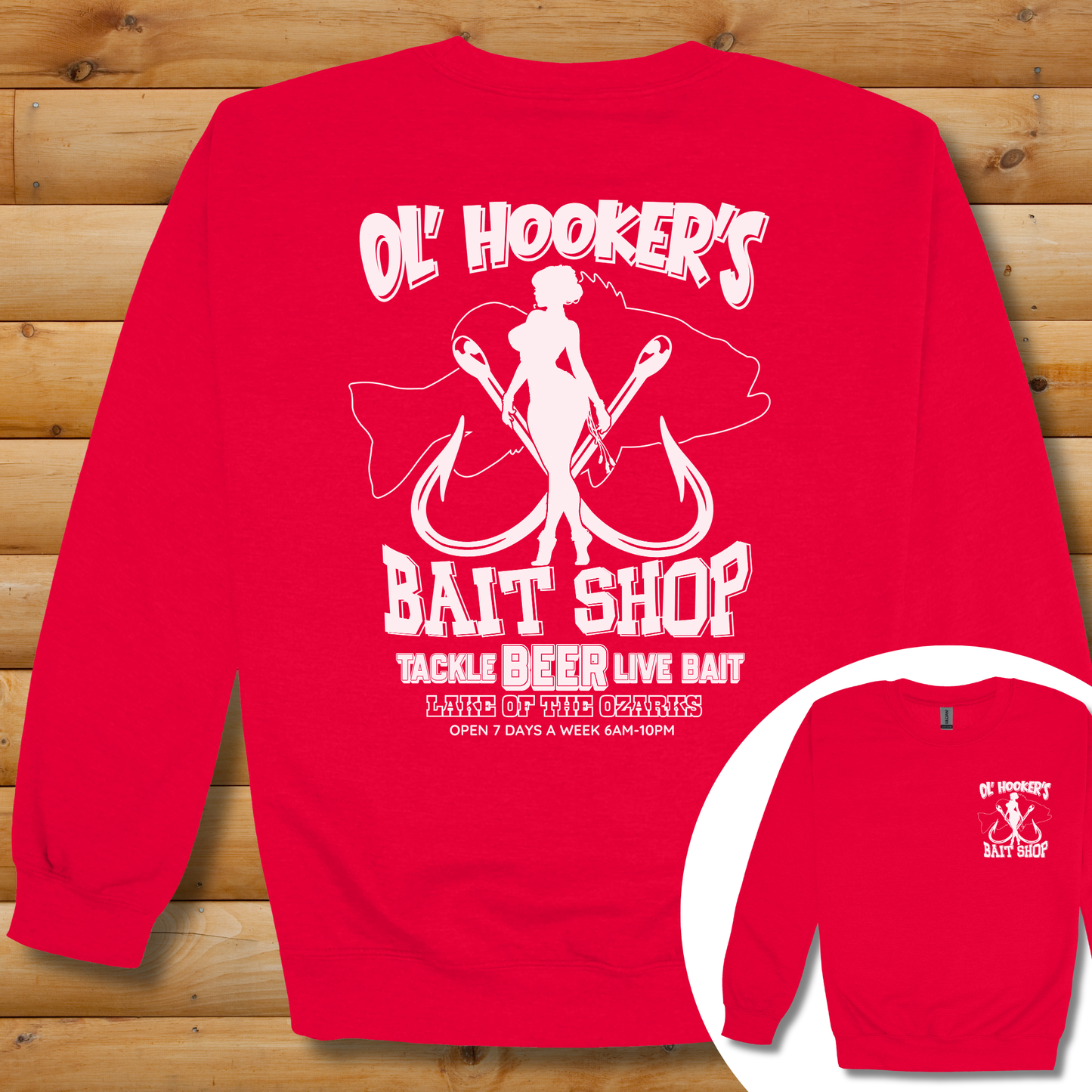 Red sweatshirt with white graphic and text on a wooden background