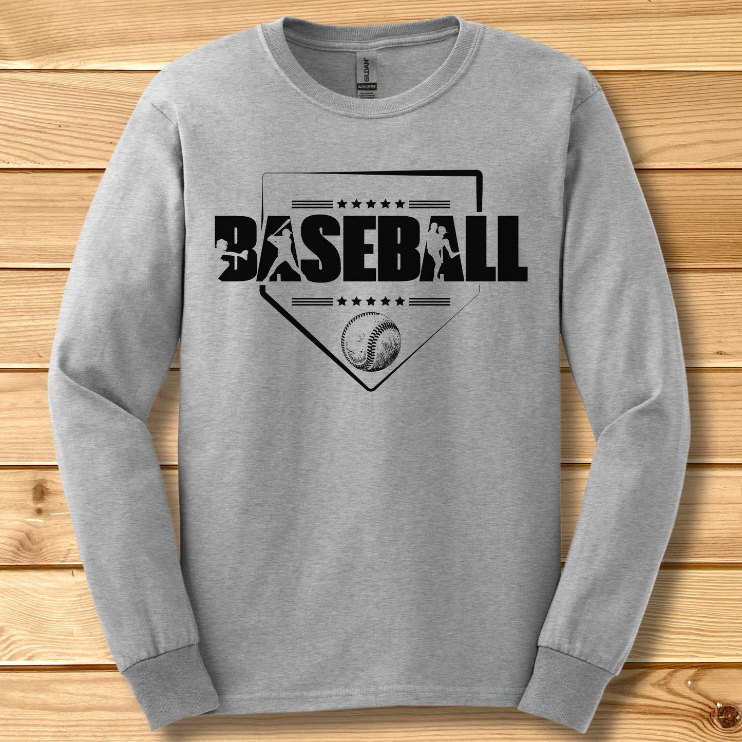 Gray long-sleeve shirt with 'BASEBALL' design on a wooden background