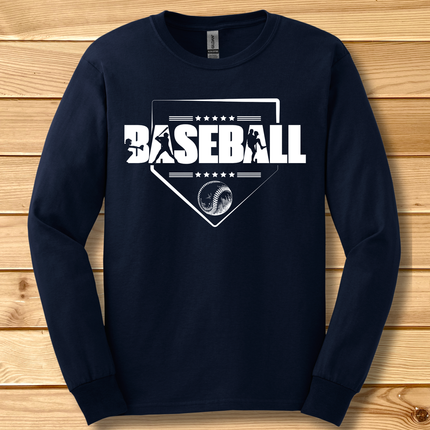 Navy blue long-sleeve shirt with 'BASEBALL' design on a wooden surface