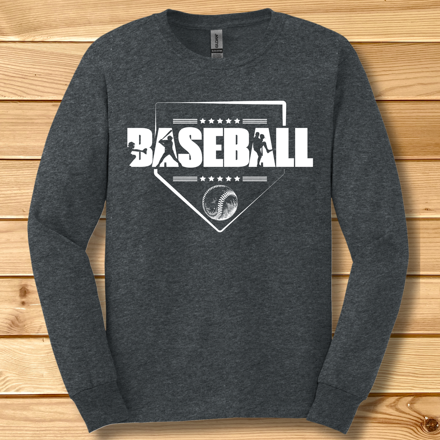 Dark gray long-sleeve shirt with 'BASEBALL' design on a wooden background