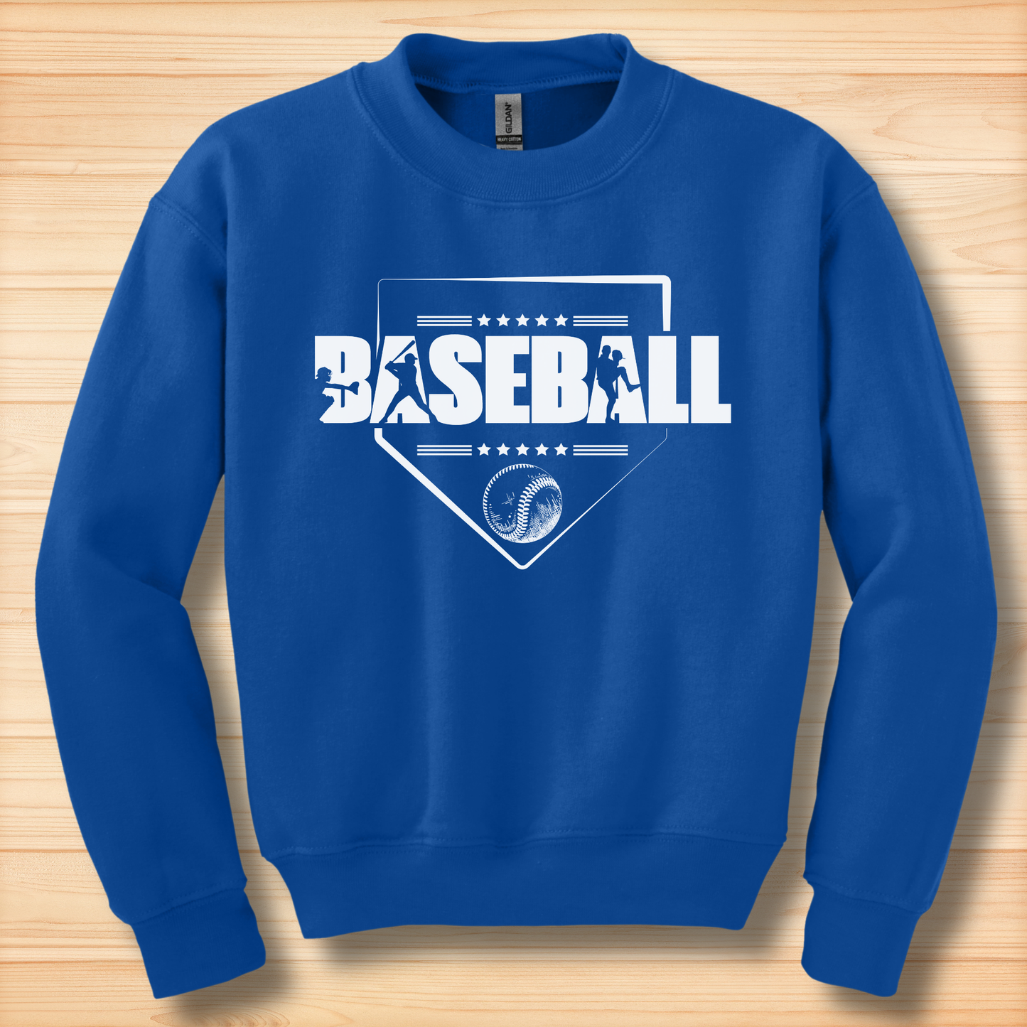 Blue sweatshirt with 'BASEBALL' design on a wooden surface