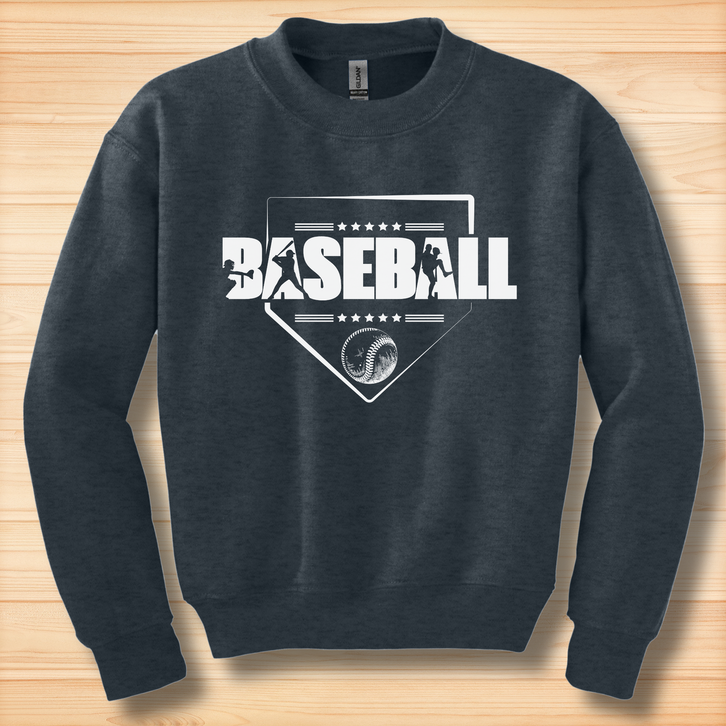 Navy blue sweatshirt with white 'BASEBALL' graphic on a wooden surface