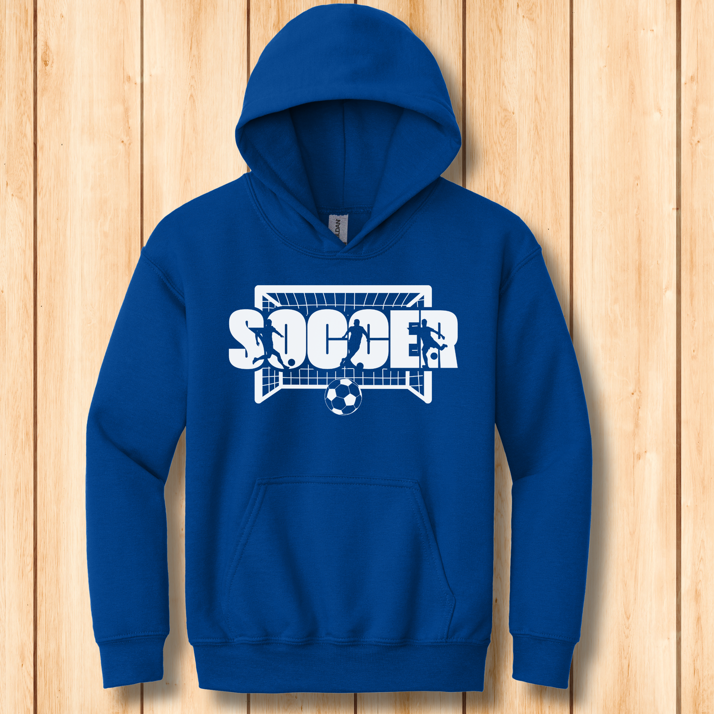 Blue hoodie with soccer graphic on a wooden background