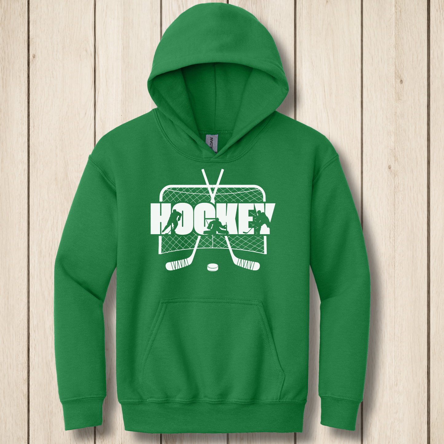 Green hoodie with hockey graphic on a wooden surface