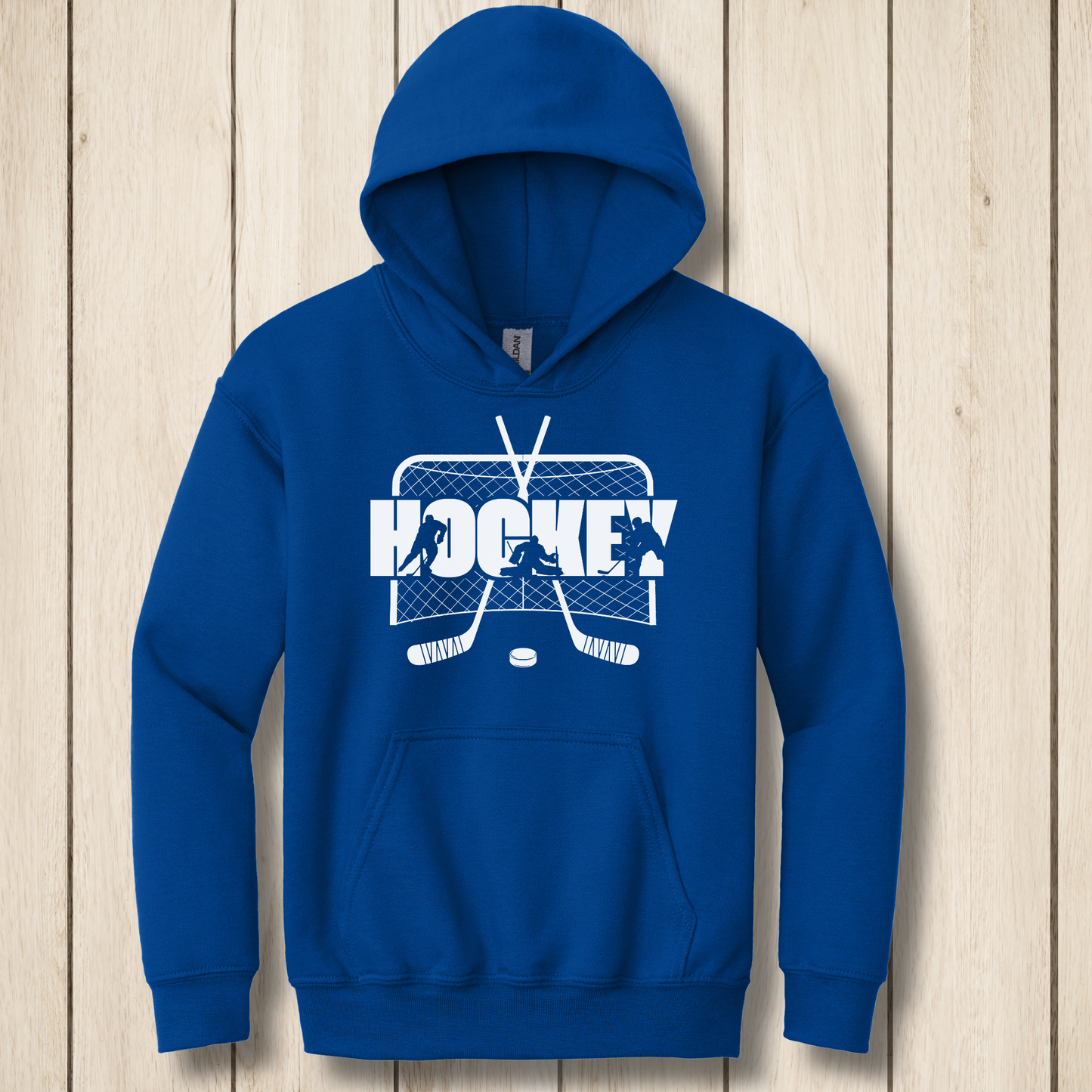 Blue hoodie with hockey graphic on a wooden surface