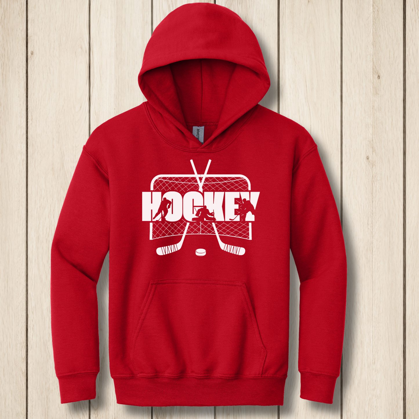 Red hoodie with 'Hockey' graphic on a wooden surface