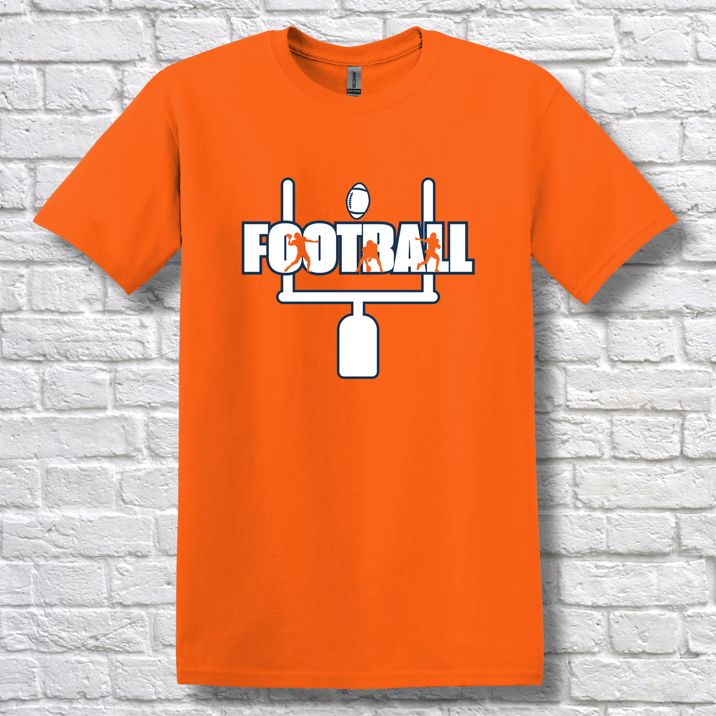 Orange t-shirt with football graphic and text on a white brick wall background