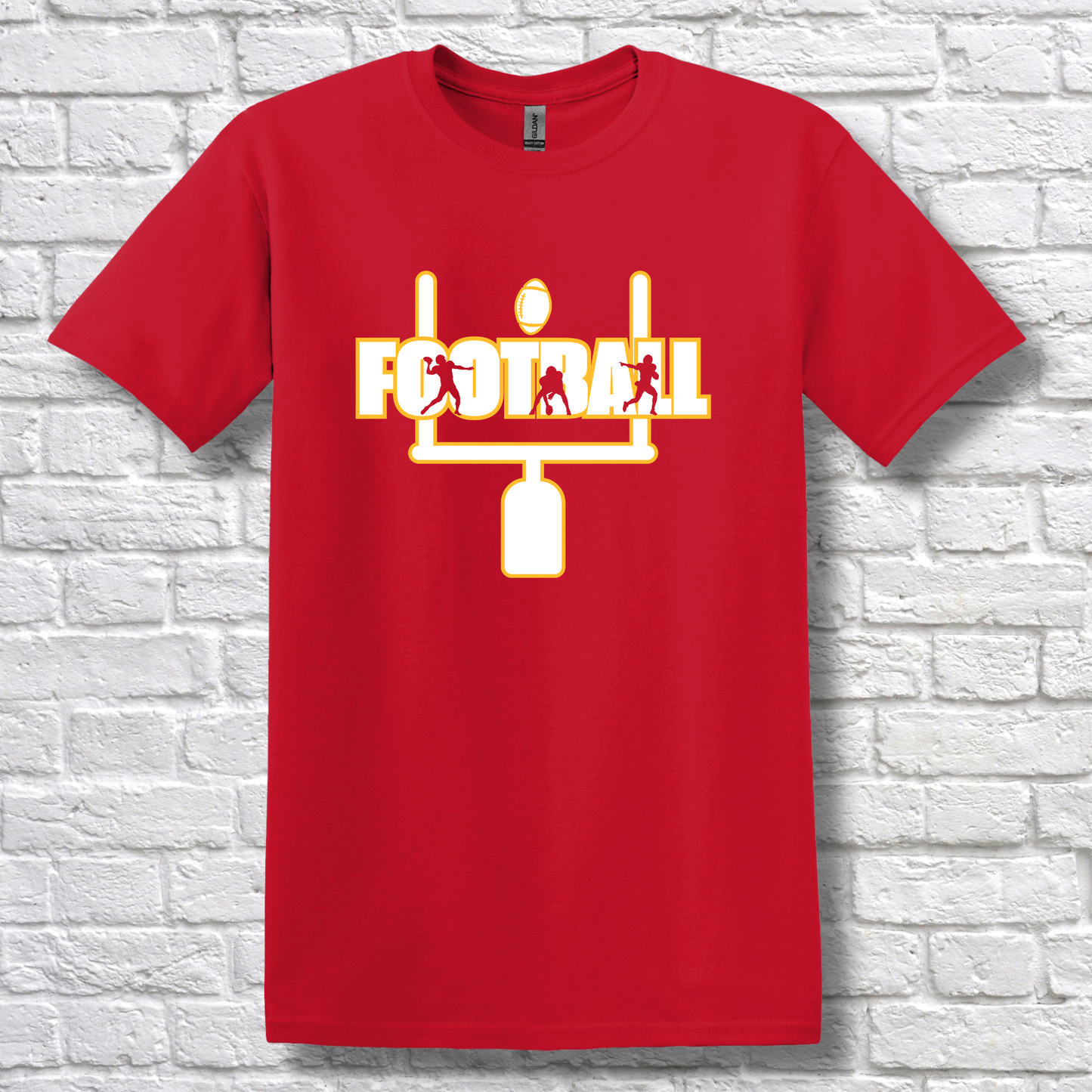 Red t-shirt with football graphic design on a white brick wall background