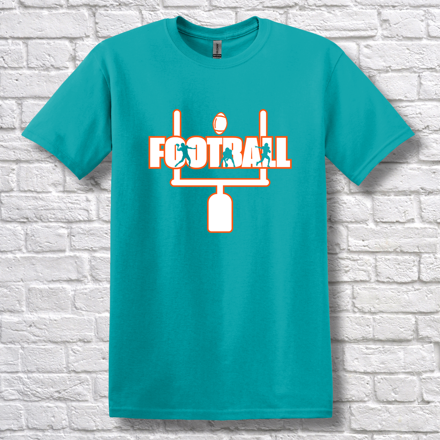 Teal t-shirt with 'FOOTBALL' graphic on a white brick wall background