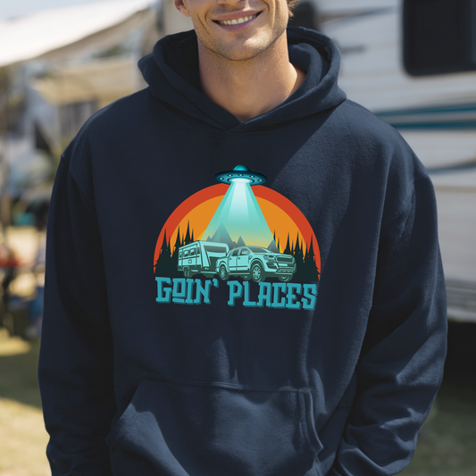 Person wearing a navy hoodie with a graphic design and text, standing outdoors.