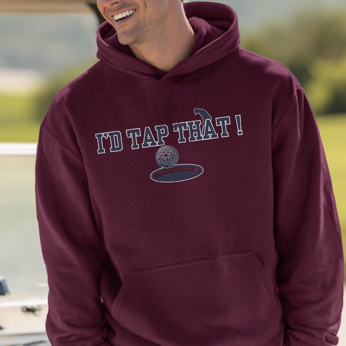 Person wearing a maroon hoodie with 'I'd Tap That!' text and graphic.