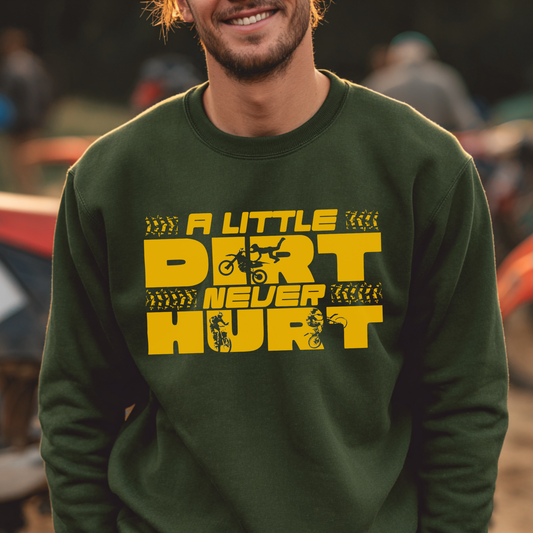 Man wearing a green sweatshirt with yellow text and graphics in an outdoor setting