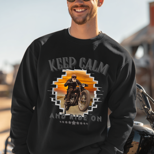 Person wearing a black sweatshirt with a graphic design and text, standing next to a motorcycle.