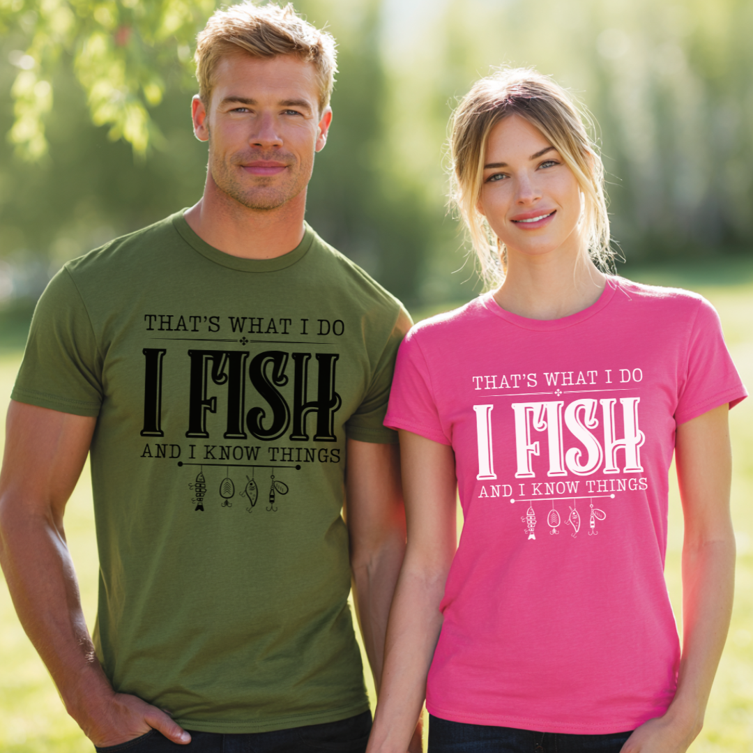 Man and woman wearing matching t-shirts with humorous fishing text in a natural setting.