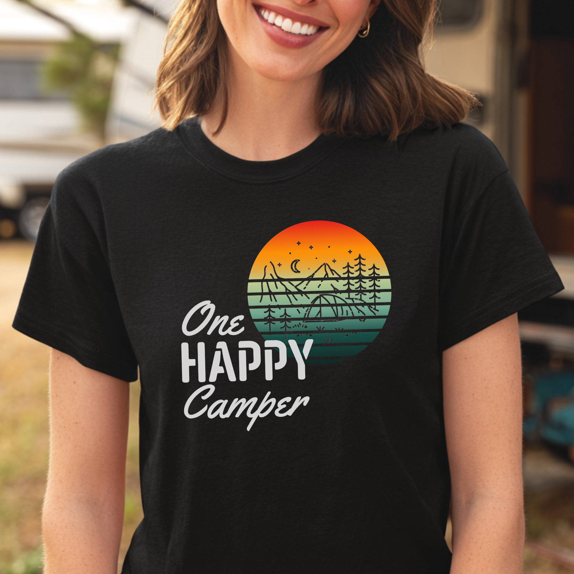 Person wearing a black t-shirt with 'One Happy Camper' graphic design.