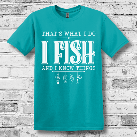 Teal t-shirt with white text and graphics on a brick wall background