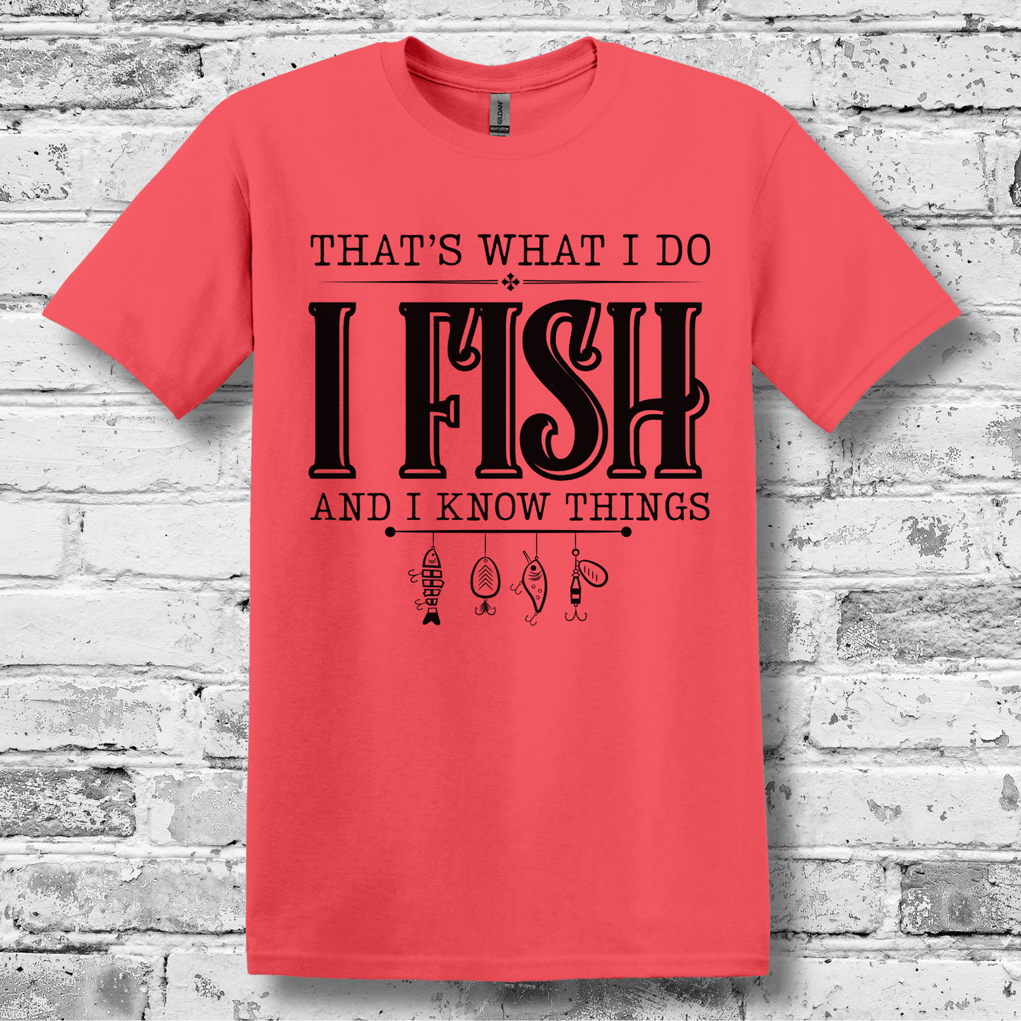 Red t-shirt with black text on a white brick wall background